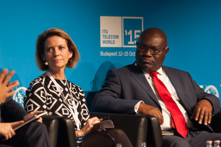 Speakers in conversation at a technology conference
